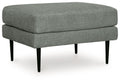 Charcoal upholstered ottoman with rounded top and tapered black legs