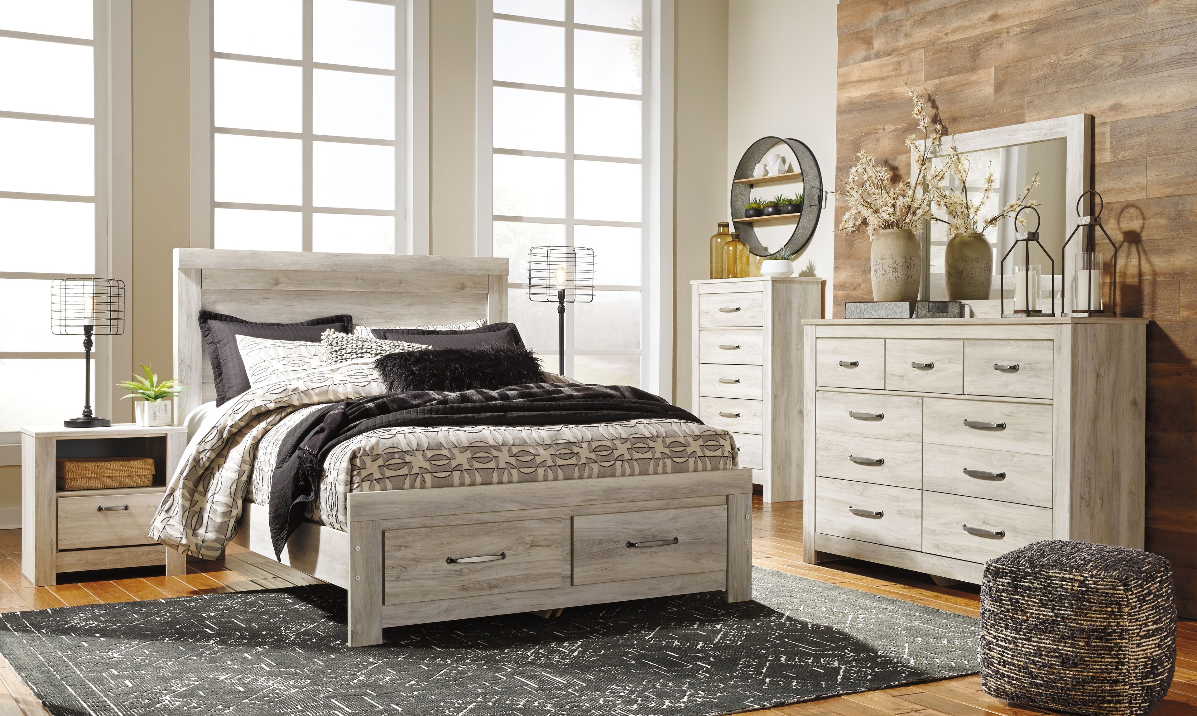 Beige platform bed frame with storage drawers and upholstered headboard