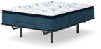 Queen plush PT 3.0 mattress, white top with blue pattern, dark teal base on legs