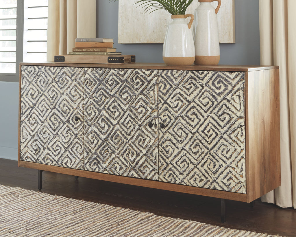 Accent cabinet with geometric fabric doors and wood base, three compartments with knobs