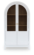 White accent cabinet with arched glass doors and brass-style knobs