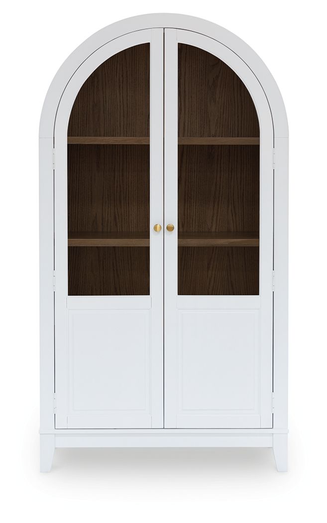 White accent cabinet with arched glass doors and brass-style knobs