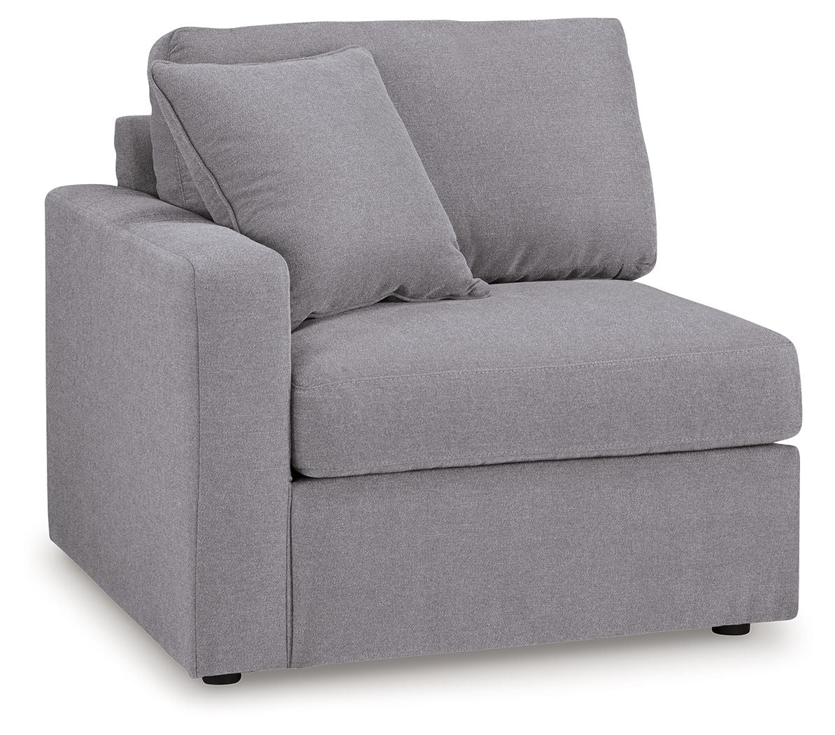 Granite gray corner chair with padded back cushions and armrests