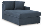 Ink blue corner chaise with padded seat, backrest, and upholstered armrests