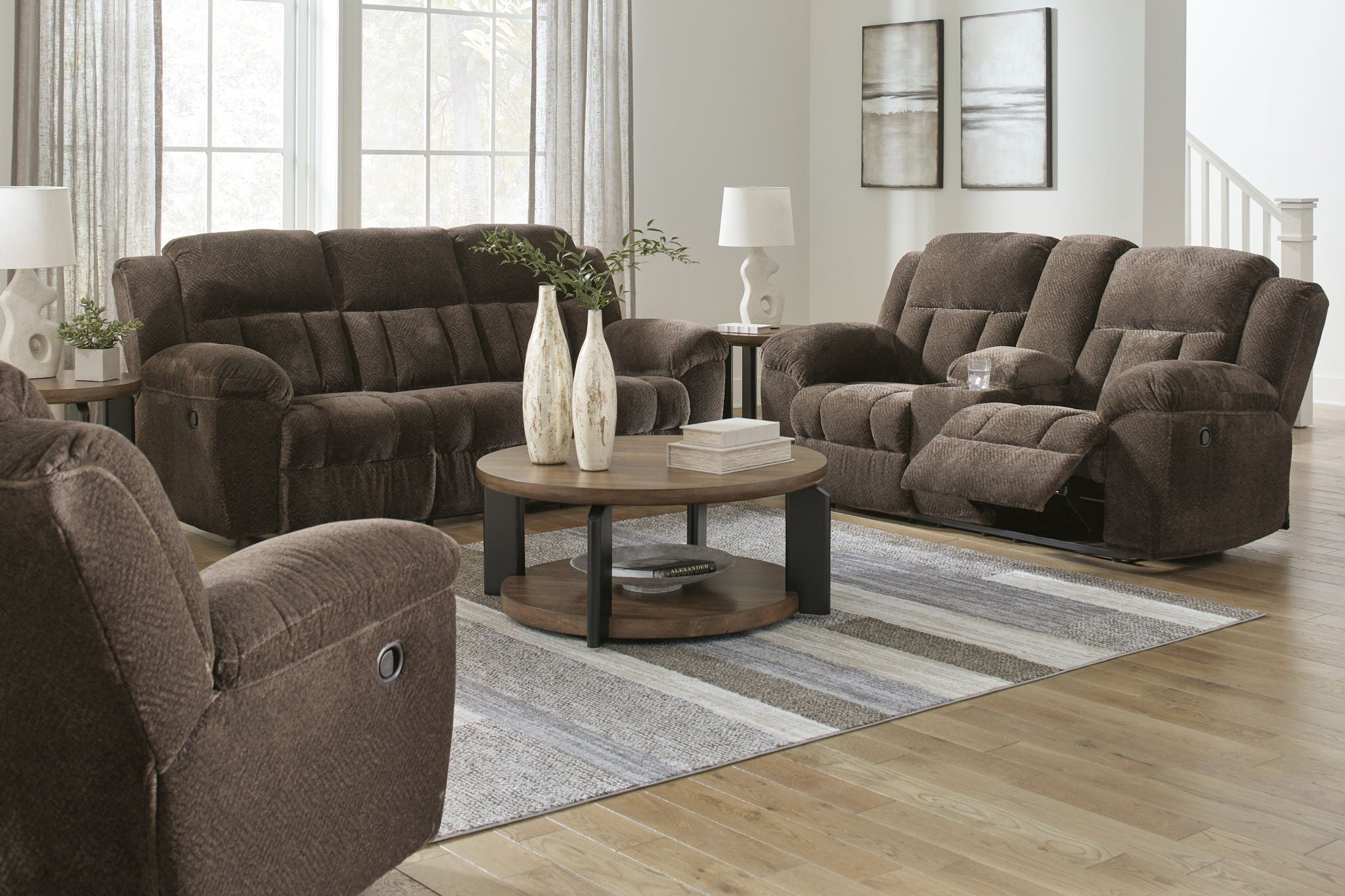 Reclining living room set with brown recliner sofa and matching recliner loveseat