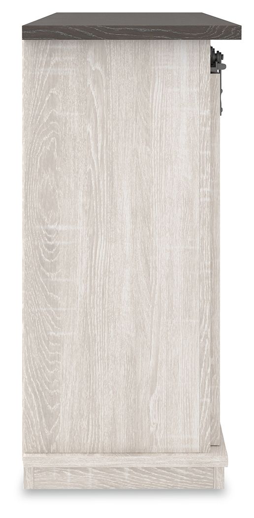 White TV stand side panel with dark top and metal hardware, open shelving inside