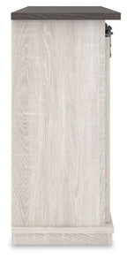 White TV stand side panel with dark top and metal hardware, open shelving inside