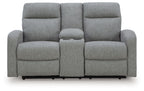 Gray double recline loveseat with three padded back cushions and two recline seats