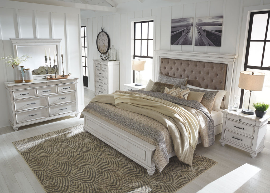Upholstered bed frame with tufted headboard and two matching nightstands