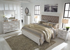 Upholstered bed frame with tufted headboard and two matching nightstands