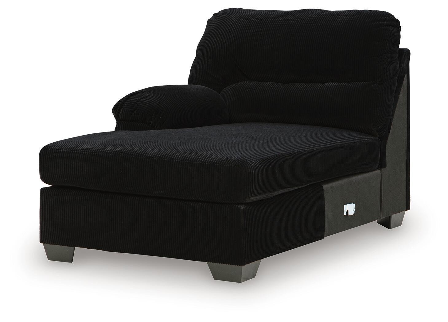 Corner chaise with dark upholstery, wide chaise seat, and squared side panel