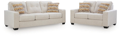 Beige fabric sofa and matching recliner set with patterned throw pillows