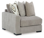 Pebble gray corner accent chair with square arms and fabric throw pillows
