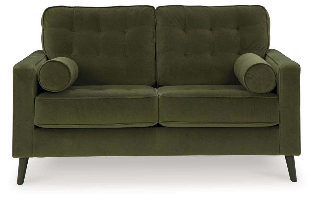 Olive green tufted loveseat with rolled arms, two seat cushions, and two bolster pillows.