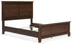 Dark brown panel bed frame with open platform base showing inner support rails.