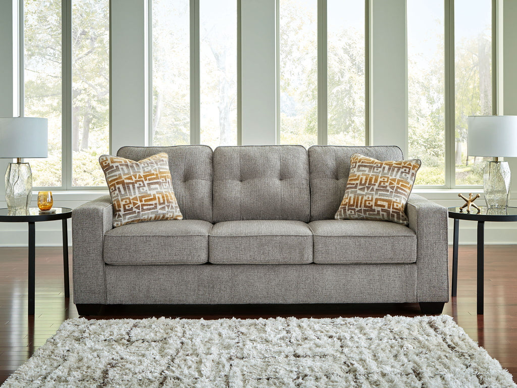 Larimer sofa in gray fabric with three seat cushions and two patterned throw pillows