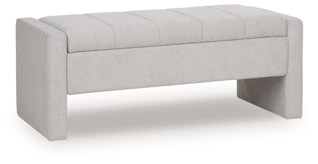 Gray storage bench with tufted upholstered top and hinged lid closed