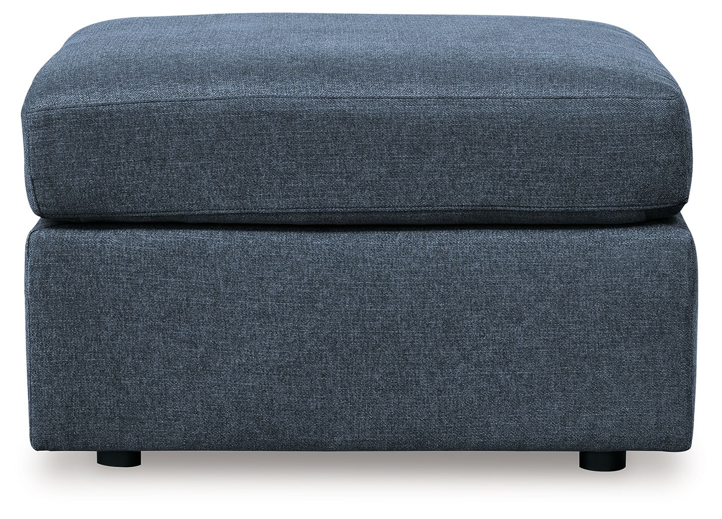Blue upholstered accent ottoman with stacked cube shape and padded seat