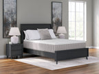 White mattress on dark platform bed, visible side channels and top surface