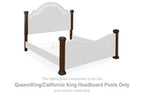 Dark brown headboard posts with rounded caps