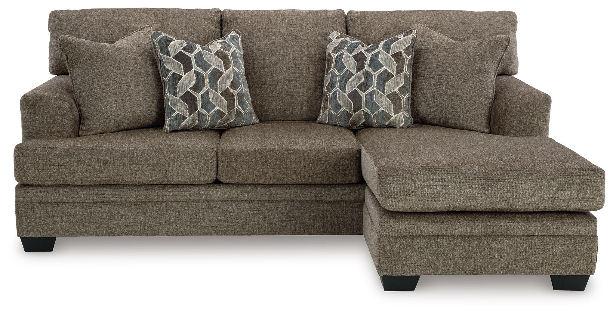 Sofa chaise in taupe fabric with two geometric patterned throw pillows