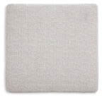 Stone upholstered ottoman top with textured weave and rounded edges