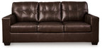 Dark brown leather sofa with tufted seat-back panels and three front cushions