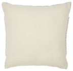 Solid cream square pillow with minimal texture and stitched edging