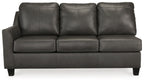 Dark gray leather sofa with three back cushions, three seat cushions, and square arms