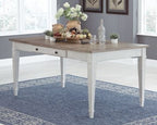 White rectangular dining table with two storage drawers and wood-look tabletop