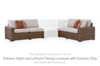 Outdoor corner loveseat set with beige cushions, brown wicker frame, rust throw pillows