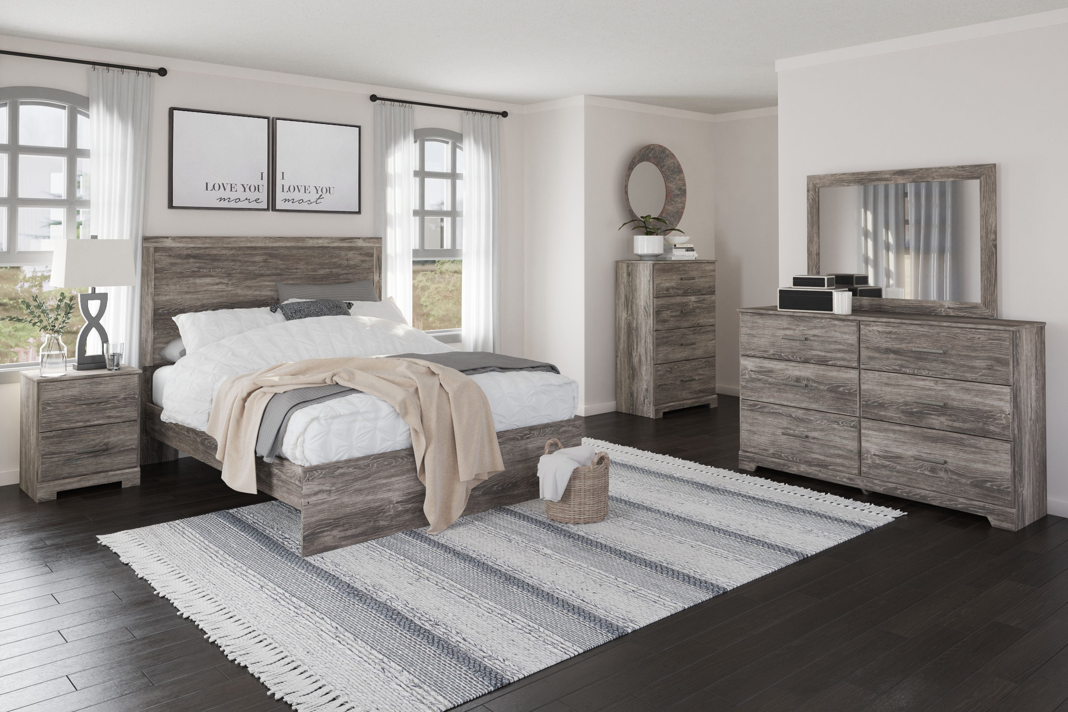 Gray wood bedroom set with bed, dresser, mirror, and nightstand