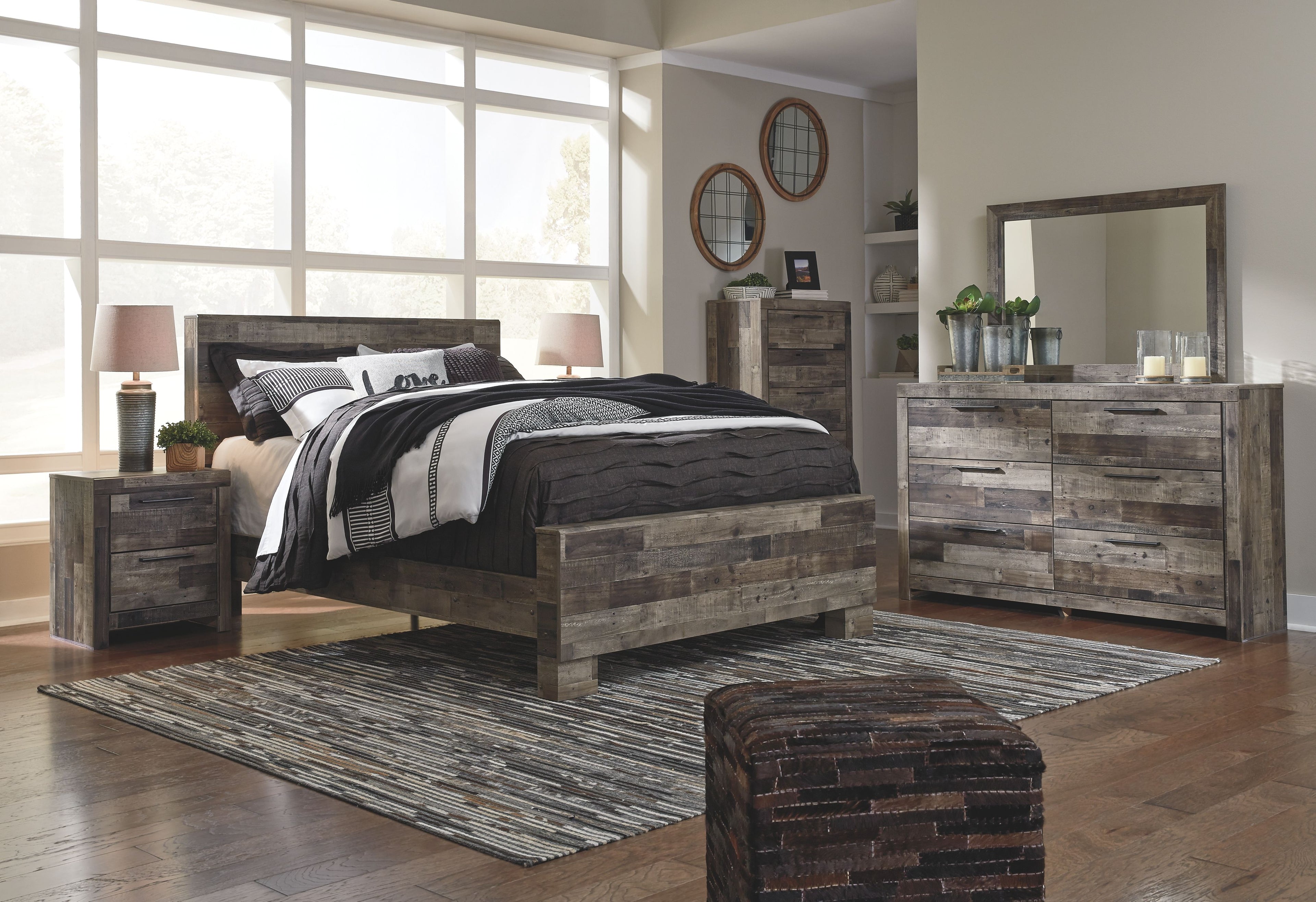 Dark wood panel bed frame with low headboard and footboard, plus two nightstands