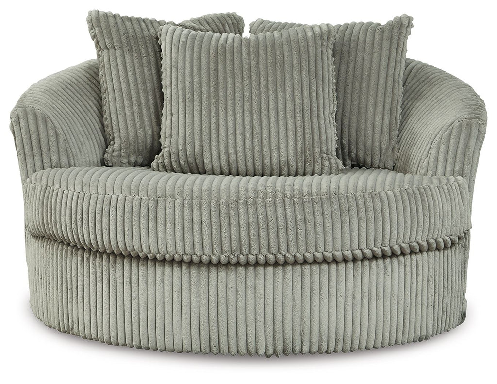 Gray oversized swivel accent chair with ribbed fabric and three tall back cushions