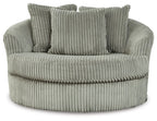 Gray oversized swivel accent chair with ribbed fabric and three tall back cushions