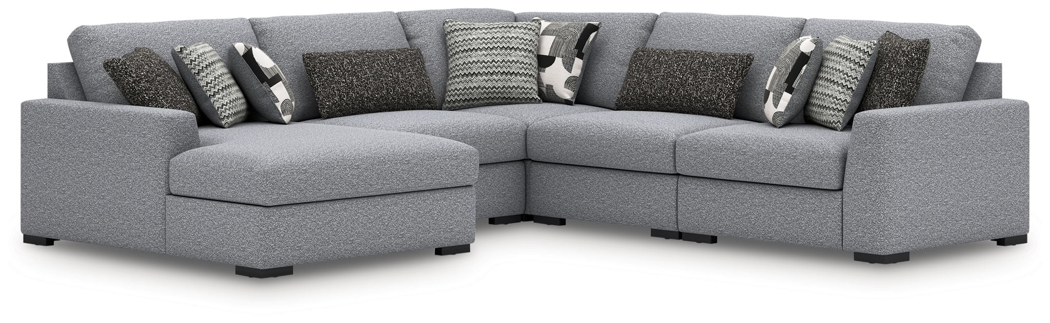 Gray sectional sofa with chaise and throw pillows, textured fabric upholstery