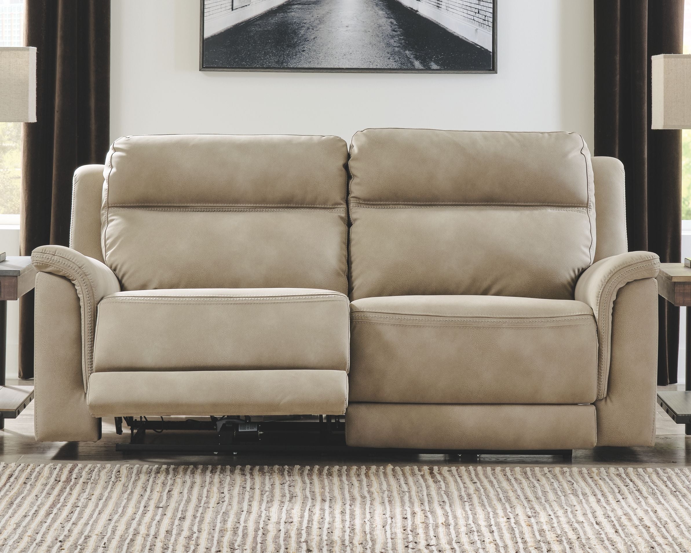 Power reclining sofa, sand beige upholstery, two-seat design with padded back headrests