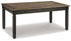 Rectangular dining table with dark legs and gray-brown wood-look tabletop