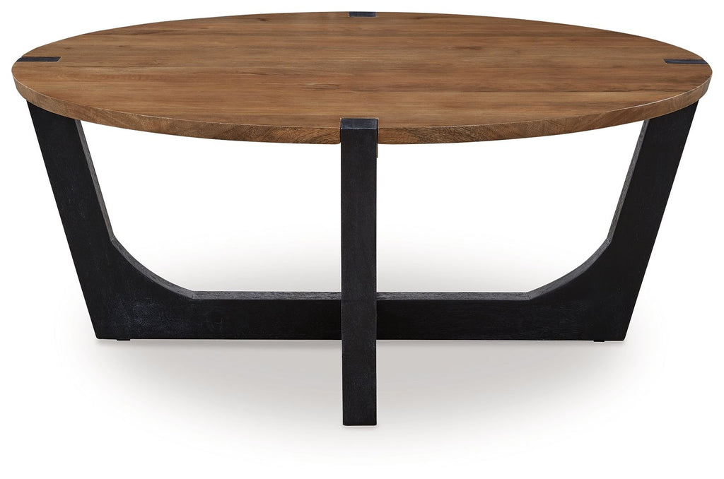 Round cocktail table with brown wood top and black metal pedestal leg