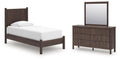 Dark brown panel platform bed and matching dresser with mirror