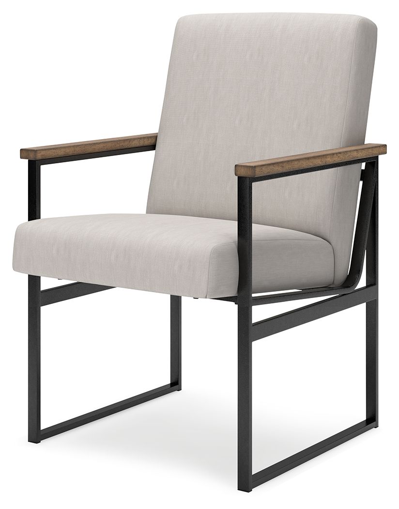 Light beige upholstered armchair with wood armrest panels and dark metal frame