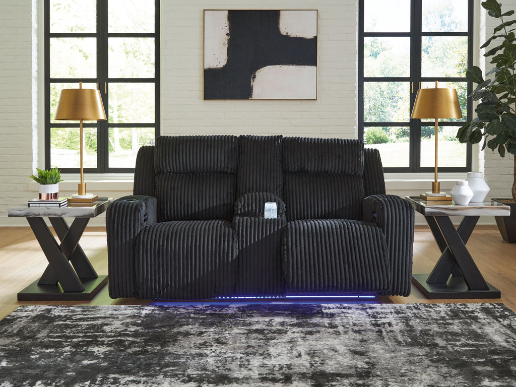 Power reclining loveseat with console armrests and adjustable headrests, dark gray ribbed fabric