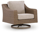 Beige cushion swivel lounge chair with woven wicker frame and round dark swivel base