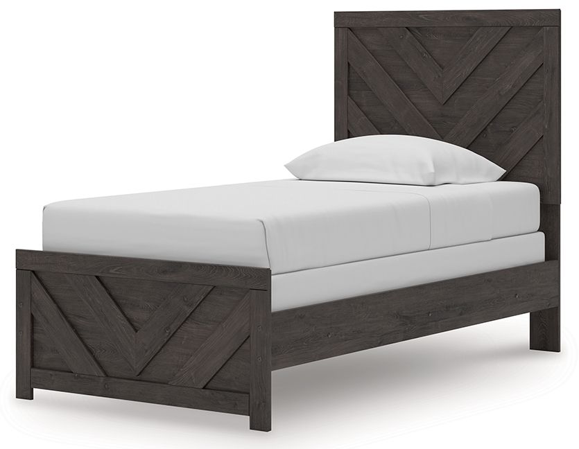 Panel bed with dark gray chevron headboard, white mattress, matching platform footboard