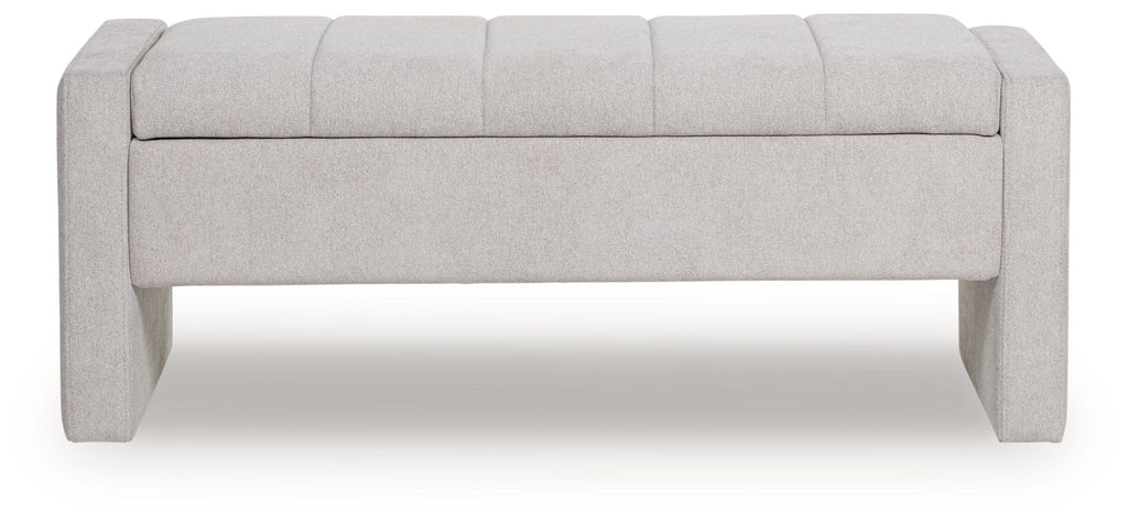 Gray upholstered storage bench with flat front panel and padded seat top