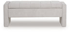 Gray upholstered storage bench with flat front panel and padded seat top