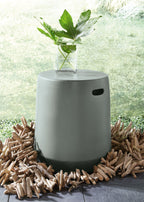 Gray cylindrical stool with oval handle cutout and flat top