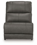 Dark gray armless chair with tall padded back and seat, vertical seam details