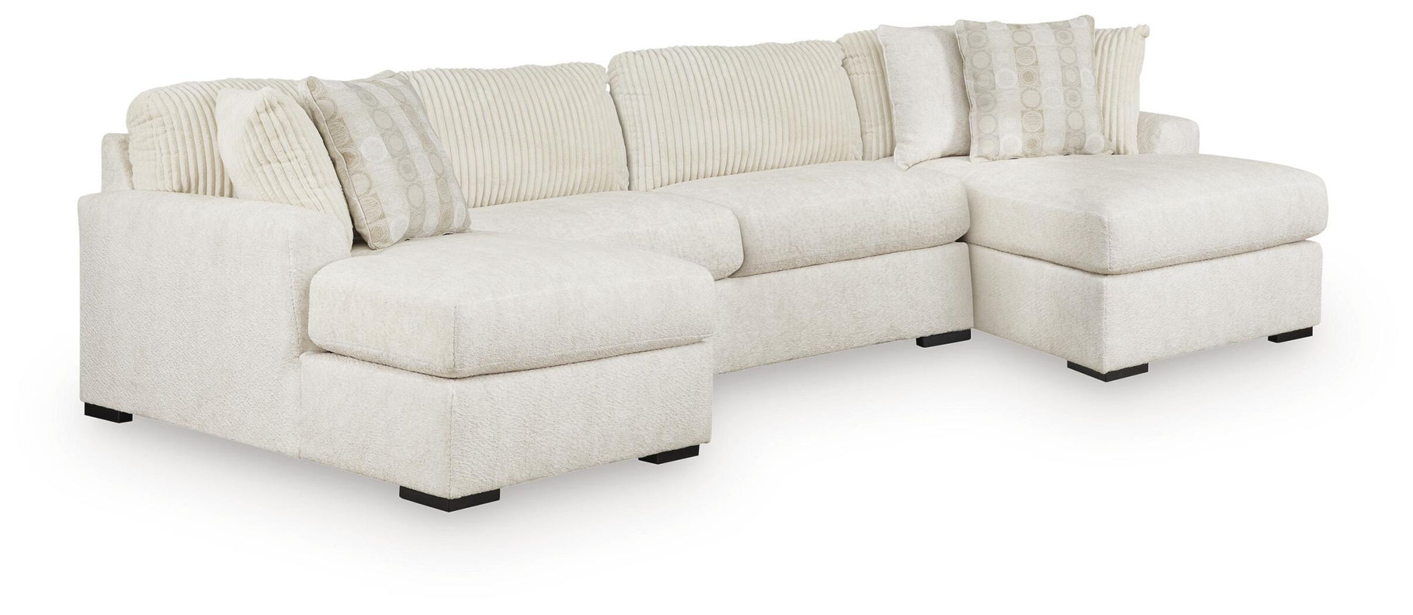 Ivory fabric sectional sofa with chaise seating, stacked back cushions, black feet