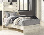 Youth bedroom bed set with light wood platform and gray quilt plus striped blanket